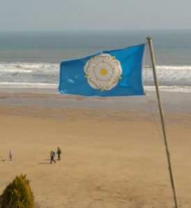 Yorkshire flag on Filey Bay beach